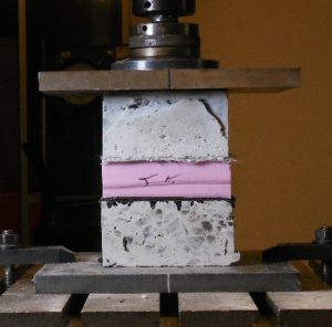 stiffness testing of combined concrete, insulation, drainage board, and waterproofing system