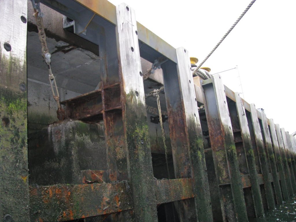 Investigation and Initial Stability Analysis of a Wharf on Severely Deteriorated Steel H-Piles