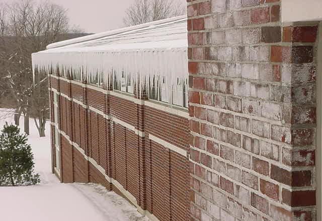 snow and ice on building exterior