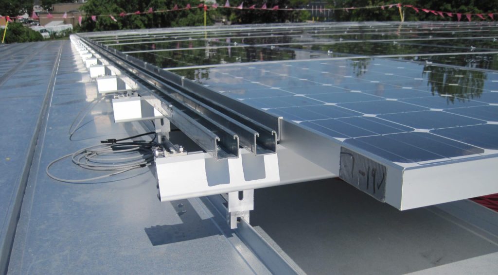 Understanding How Photovoltaic Systems Affect Low-Slope Roofing Projects