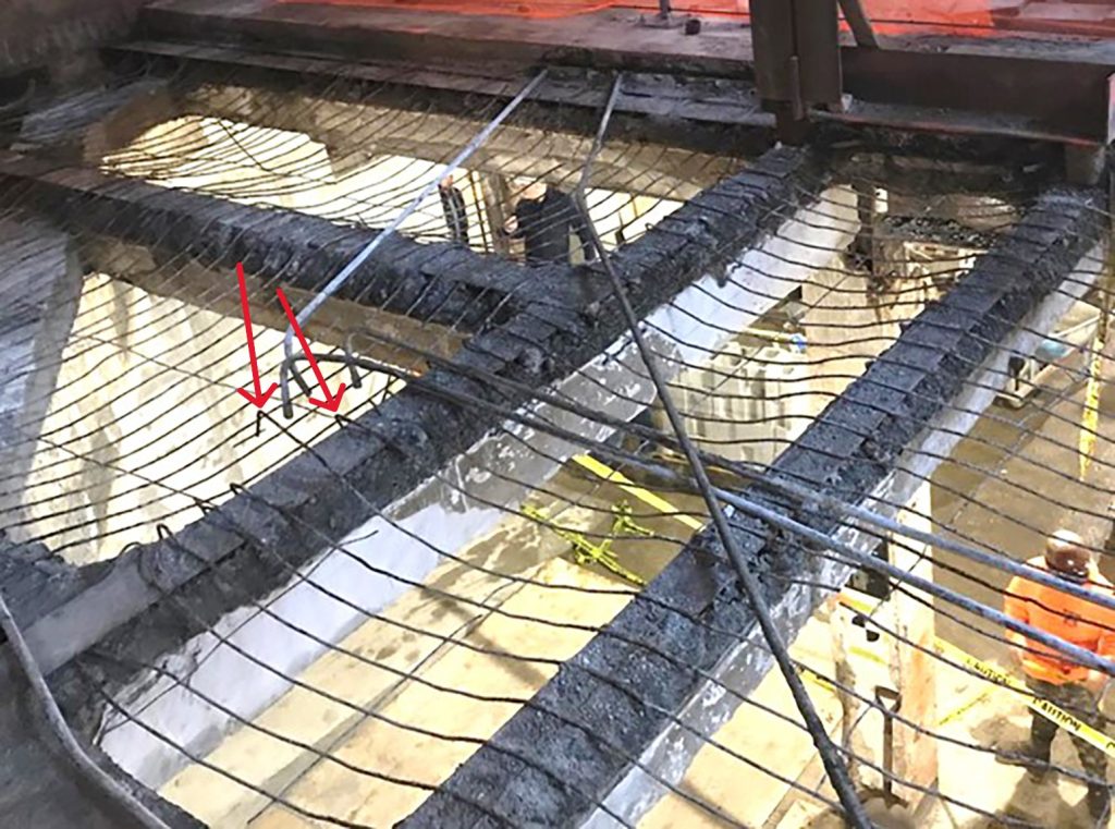 Opening the Drapes: Shedding Light on Draped-Mesh Cinder-Concrete Floor Slabs